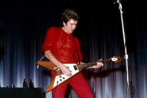 UNITED KINGDOM - OCTOBER 21: Photo of Steve JONES and Johnny ROTTEN and SEX PISTOLS; Johnny Rotten (John Lydon) & Steve Jones (playing Gibson Flying V guitar) performing live onstage at Dunstable's Queensway Hall (Photo by Chris Morphet/Redferns)